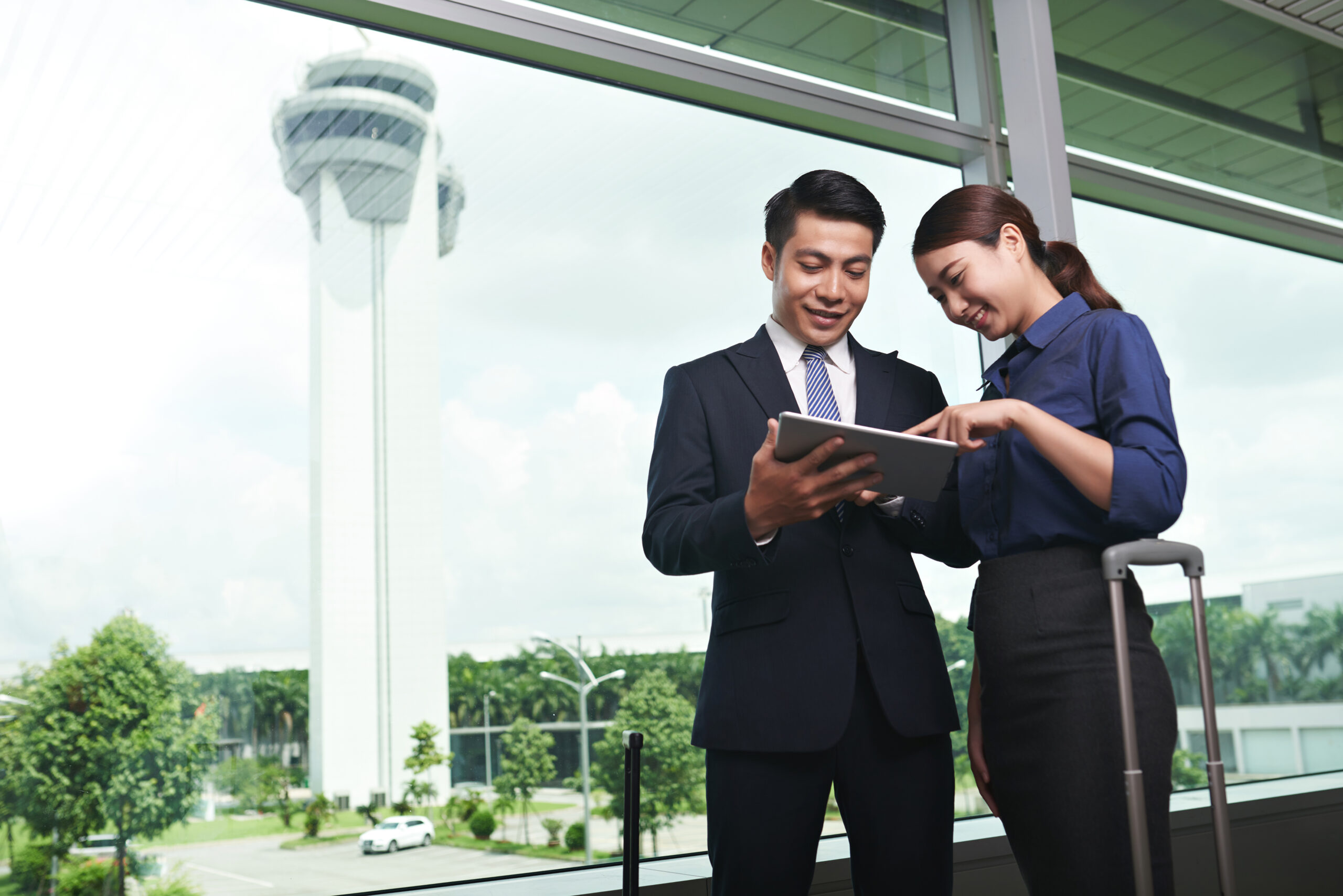 Asian Business People Landing in Airport